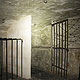 La cave du Donjon de Miss Lilith - Pierres brutes, grilles et anneaux...